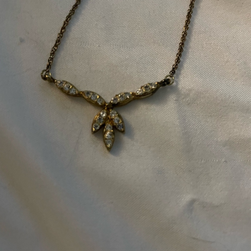 Elegant Gold tone necklace with rhinestone Accents